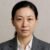 Sophisticated woman in professional business suit with neutral background, emphasizing confidence and leadership for corporate and professional SEO keywords.